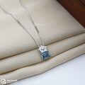 Blue Stone and Crown Silver Chain Pendant