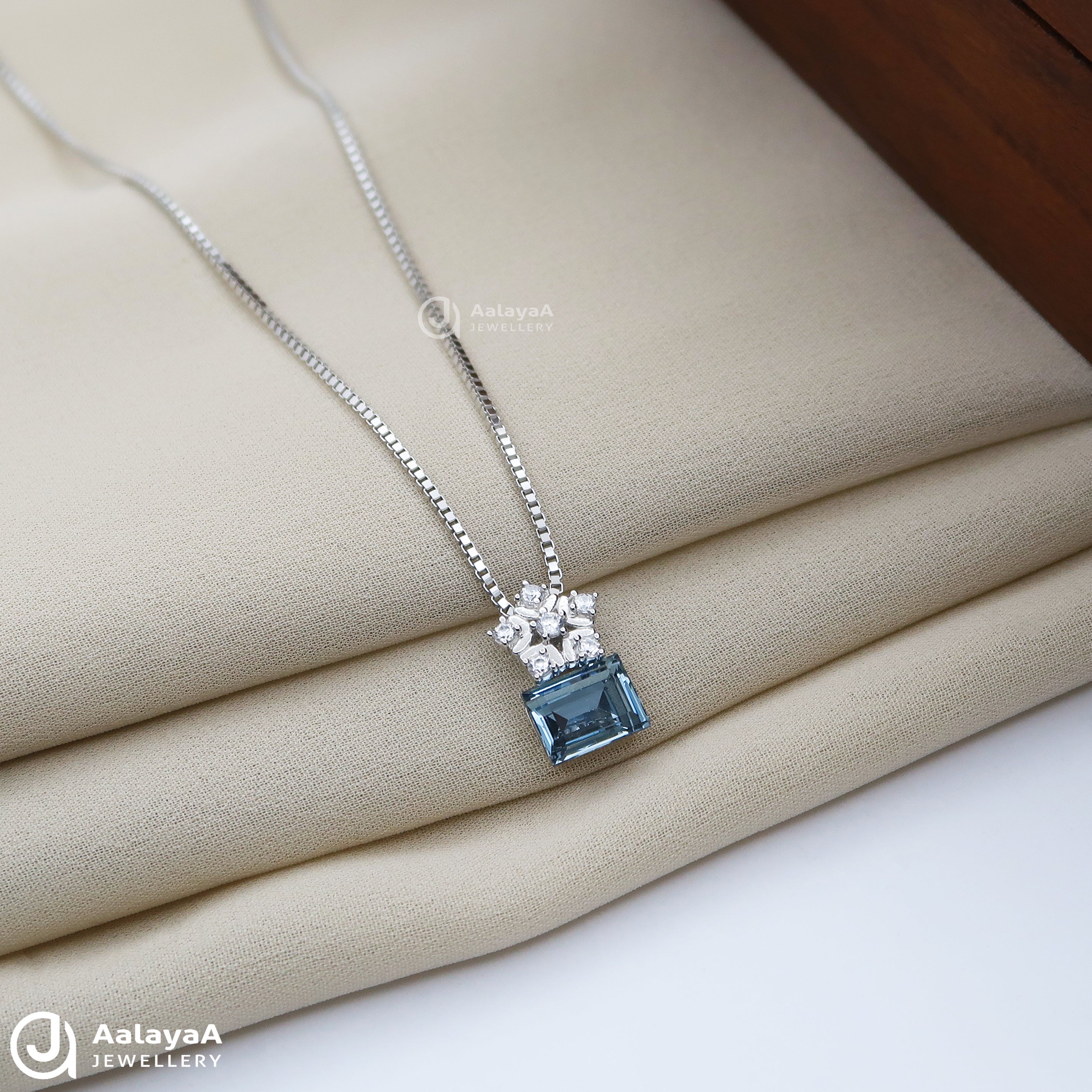 Blue Stone and Crown Silver Chain Pendant