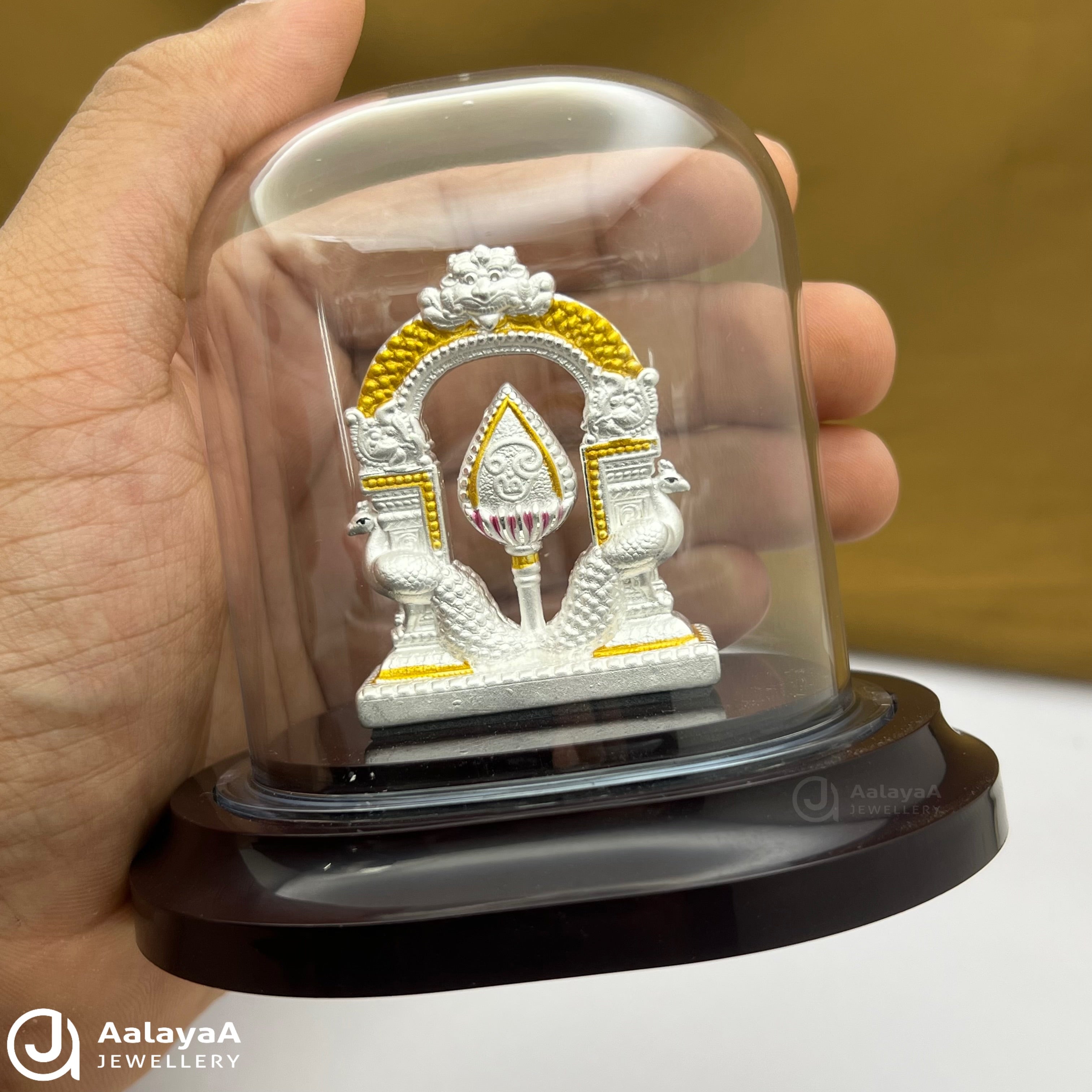 Silver Peacock And Vel Idol