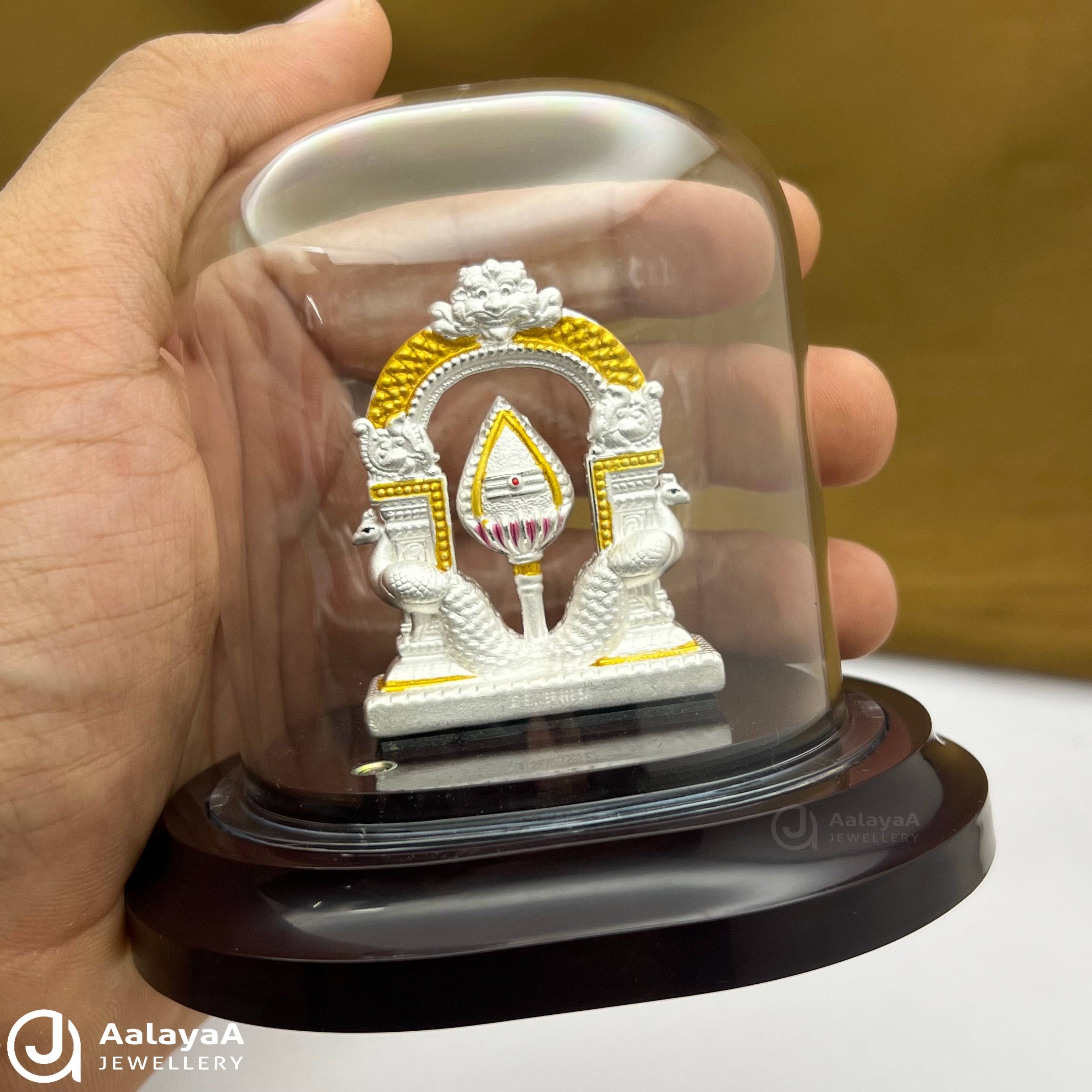 Silver Peacock And Vel Idol